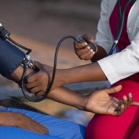 africa-humanitarian-aid-doctor-taking-care-patient-scaled-qu8i6564crb644ga2c993gvn3ui35qtqxzb1ofnh5s